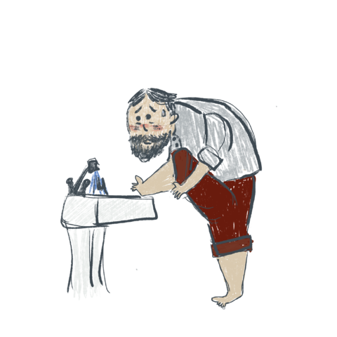 a man takes an ablution in a sink