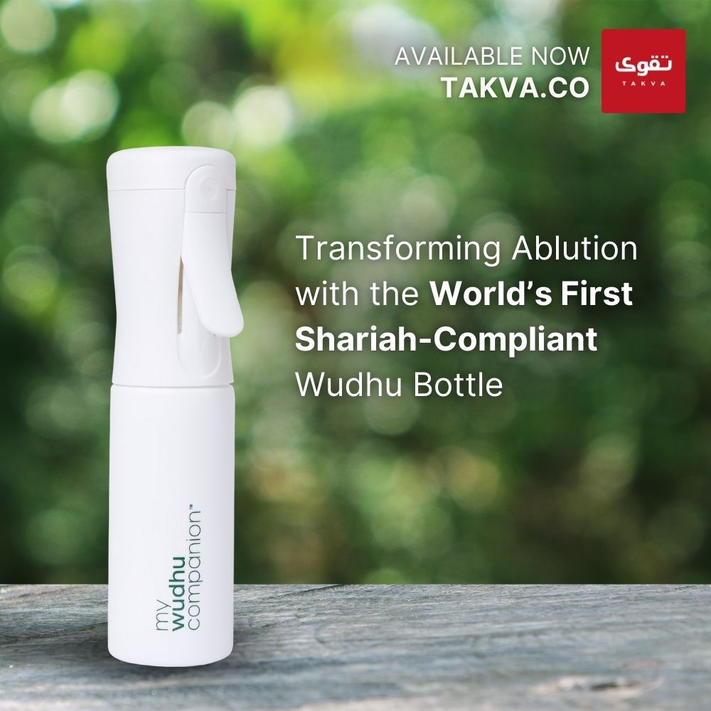 White Wudhu bottle with text about Shariah-compliant product on a blurred green background