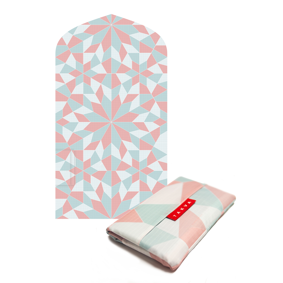 Image of the pink prayer mat being unfolded and spread out on the ground: "Waterproof prayer mat - our prayer rug is made from durable and waterproof materials, making it ideal for use in any weather conditions."