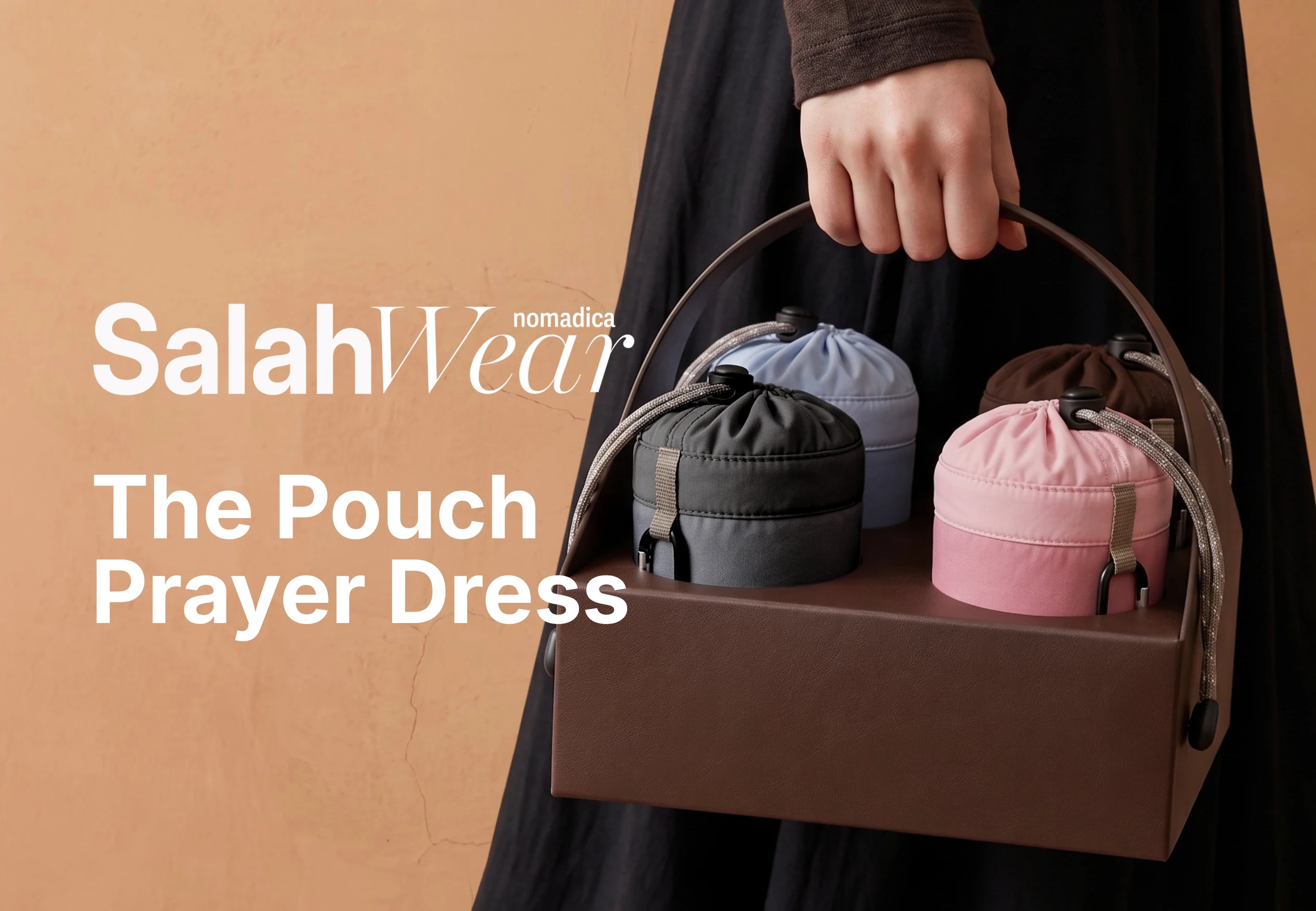 SalahWear by TAKVA Nomadica branding hero image, text reading 'SalahWear — The Pouch Prayer Dress,' showing a woman carrying a leather-look caddy tray holding four colour-matched SalahWear travel prayer dress pouches (black, pink, blue, brown).