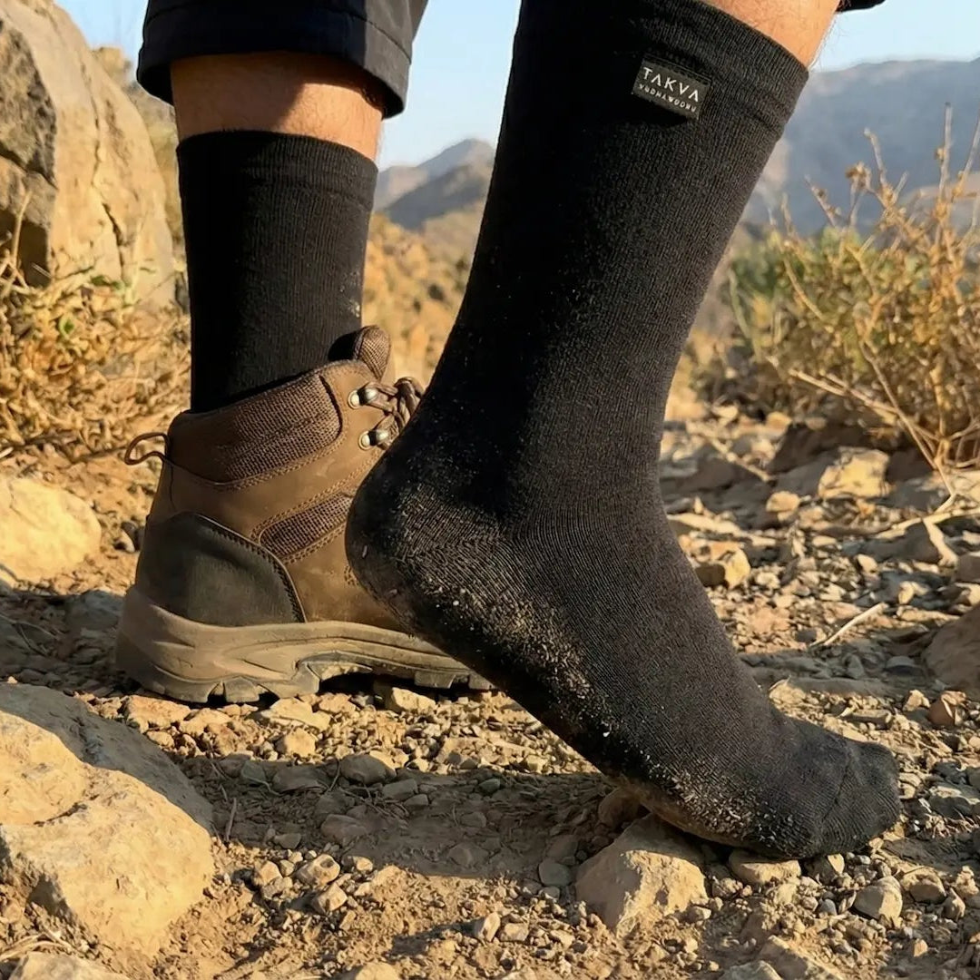 takva-wudhu-socks-on-rocky-terrain-durable-abrasion-resistant