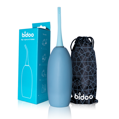 Portable bidet for Muslims with sprayable bottle: "Portable bidet for Muslims with sprayable bottle - a convenient and discreet solution for maintaining Islamic hygiene on-the-go in Aqua blue color.