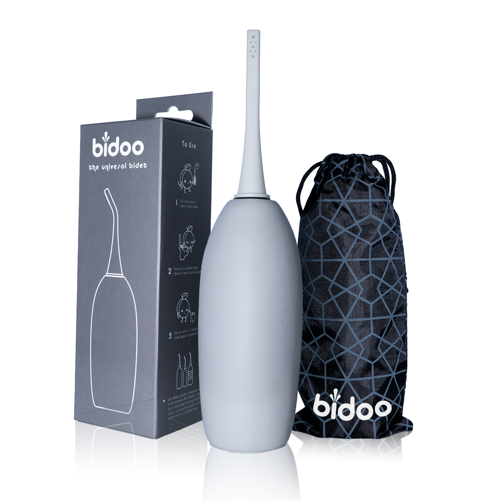 Portable bidet for Muslims with sprayable bottle: "Portable bidet for Muslims with sprayable bottle - a convenient and discreet solution for maintaining Islamic hygiene on-the-go in grey color.