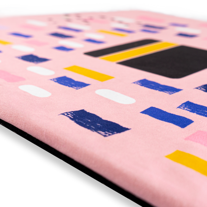 Image of the pink prayer mat being used as a prayer rug: "Prayer mat Islamic - a versatile and convenient prayer rug for kids that can be used in home."