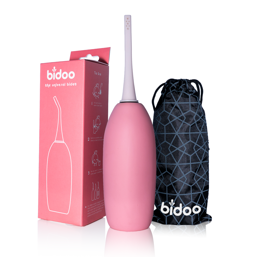 Portable bidet for Muslims with sprayable bottle: "Portable bidet for Muslims with sprayable bottle - a convenient and discreet solution for maintaining Islamic hygiene on-the-go in pink salt color