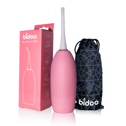 Portable bidet for Muslims with sprayable bottle: "Portable bidet for Muslims with sprayable bottle - a convenient and discreet solution for maintaining Islamic hygiene on-the-go in pink salt color