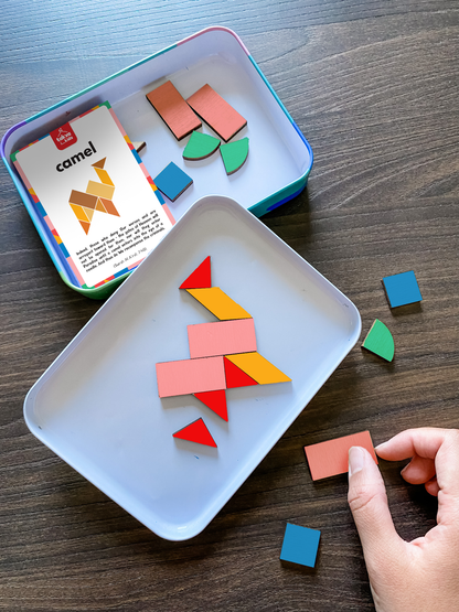 Image of a child playing with the puzzle set: "Interactive Islamic toy for kids - a wooden-magnetic Arabic alphabet puzzle set that engages children and helps them learn.