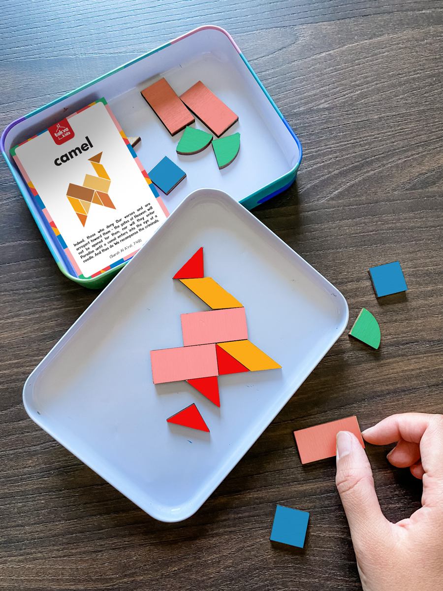 Image of a child playing with the puzzle set: "Interactive Islamic toy for kids - a wooden-magnetic Arabic alphabet puzzle set that engages children and helps them learn.